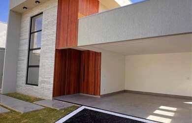 Imagem: A casa possui 4 Dormitórios, 5 Banheiros, 4 Vagas na garagem