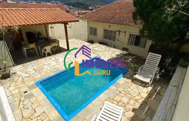 Imagem: A casa possui 3 Dormitórios, 3 Banheiros, 3 Vagas na garagem