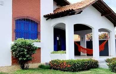 Imagem: A casa possui 5 Dormitórios, 5 Banheiros, 5 Vagas na garagem