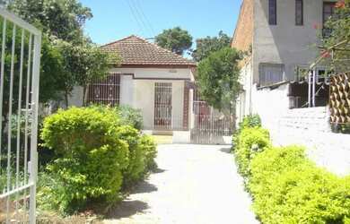 Imagem: A casa possui 2 Dormitórios, 2 Banheiros, 4 Vagas na garagem