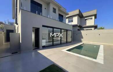 Imagem: A casa em condomínio possui 3 Dormitórios, 4 Banheiros, 4