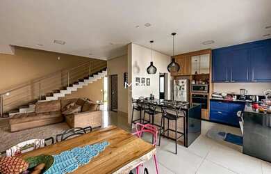 Imagem: A casa possui 3 Dormitórios, 5 Banheiros, 4 Vagas na garagem