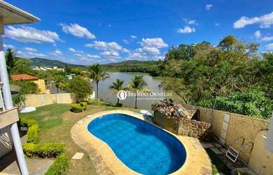Imagem: A casa possui 5 Dormitórios, 5 Banheiros, 5 Vagas na garagem