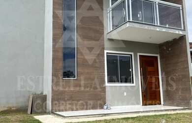 Imagem: A casa possui 2 Dormitórios, 2 Banheiros, 1 Vaga na garagem