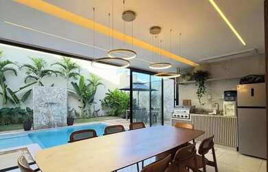 Imagem: A casa em condomínio possui 4 Dormitórios, 5 Banheiros, 4