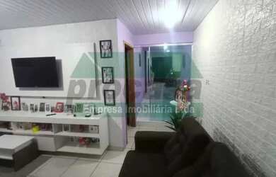 Imagem: A casa possui 2 Dormitórios, 1 Banheiro, 2 Vagas na garagem