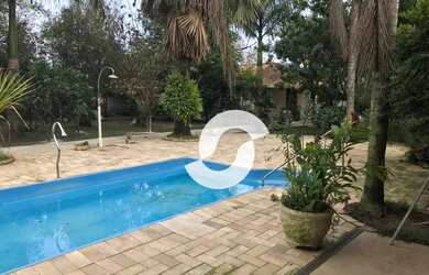 Imagem: A casa possui 5 Dormitórios, 5 Banheiros, 5 Vagas na garagem