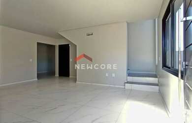 Imagem: A casa possui 3 Dormitórios, 3 Banheiros, 2 Vagas na garagem