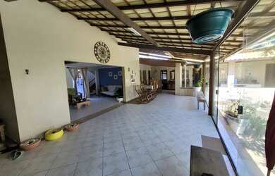 Imagem: A casa possui 5 Dormitórios, 5 Banheiros, 5 Vagas na garagem