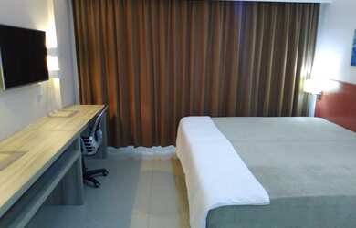 Imagem: O apartamento possui 1 Dormitório, 1 Banheiro, 1 Vaga na garagem