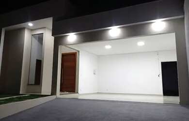 Imagem: A casa possui 3 Dormitórios, 4 Banheiros, 5 Vagas na garagem