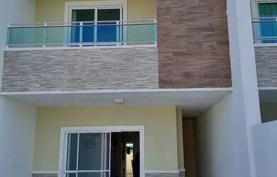 Imagem: A casa possui 3 Dormitórios, 3 Banheiros, 3 Vagas na garagem