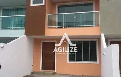 Imagem: A casa possui 3 Dormitórios, 2 Banheiros, 2 Vagas na garagem