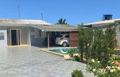 Imagem: A casa possui 3 Dormitórios, 2 Banheiros e está localizado