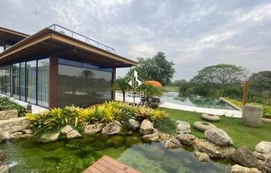 Imagem: A casa em condomínio possui 5 Dormitórios, 1 Banheiro, 1.000m²