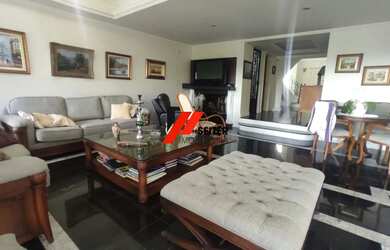 Imagem: A casa possui 5 Dormitórios, 4 Banheiros, 4 Vagas na garagem