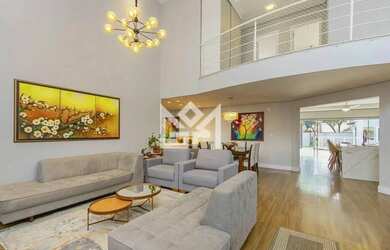 Imagem: A casa possui 3 Dormitórios, 4 Banheiros, 3 Vagas na garagem