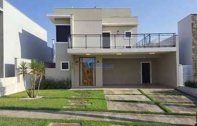 Imagem: A casa possui 3 Dormitórios, 5 Banheiros, 4 Vagas na garagem