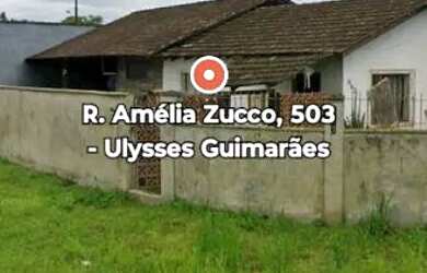 Imagem: A casa possui 2 Dormitórios, 1 Banheiro, 2 Vagas na garagem