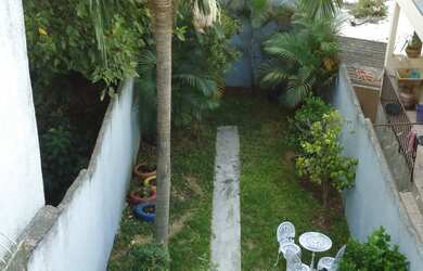 Imagem: A casa possui 3 Dormitórios, 4 Banheiros, 2 Vagas na garagem