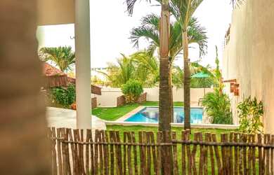 Imagem: A casa possui 4 Dormitórios, 2 Vagas na garagem e está localizado