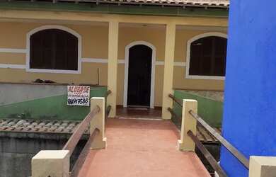 Imagem: A casa possui 2 Dormitórios e 2 Vagas na garagem e está localizado