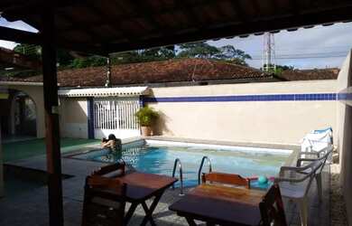 Imagem: A casa possui 2 Dormitórios, 1 Vaga na garagem e está localizado