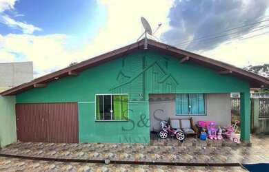 Imagem: A casa possui 4 Dormitórios, 2 Banheiros, 2 Vagas na garagem