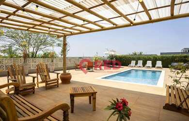 Imagem: A casa em condomínio possui 4 Dormitórios, 5 Banheiros, 350m²