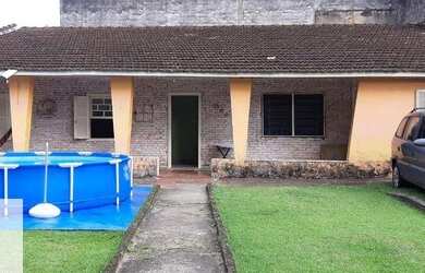 Imagem: A casa e possui 2 Dormitórios, Suítes, 2 Banheiros, 5 Vagas