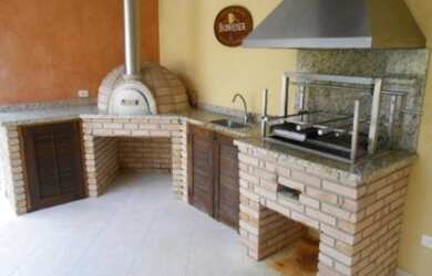 Imagem: A casa em condomínio possui 4 Dormitórios, 5 Banheiros, 4