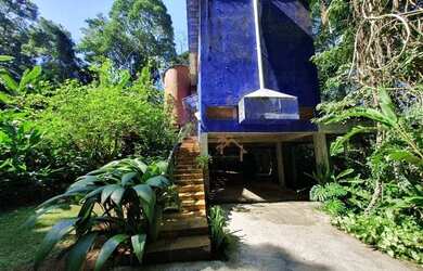 Imagem: A casa possui 2 Dormitórios, 2 Banheiros, 4 Vagas na garagem