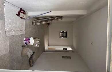 Imagem: A casa possui 4 Dormitórios, 4 Banheiros, 2 Vagas na garagem