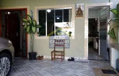 Imagem: A casa possui 3 Dormitórios, 3 Banheiros, 4 Vagas na garagem