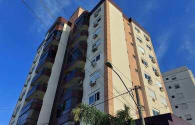 Imagem: O apartamento possui 3 Dormitórios, 1 Banheiro, 2 Vagas na