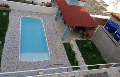 Imagem: A casa possui 3 Dormitórios, 3 Banheiros, 2 Vagas na garagem