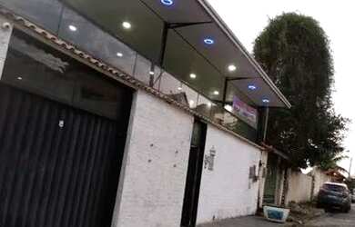 Imagem: A casa possui 5 Dormitórios, 5 Banheiros, 5 Vagas na garagem