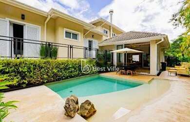 Imagem: A casa em condomínio possui 4 Dormitórios, 5 Banheiros, 4