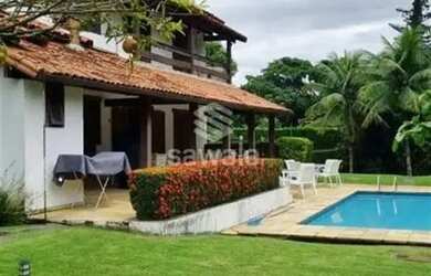 Imagem: A casa possui 5 Dormitórios, 5 Banheiros, 4 Vagas na garagem