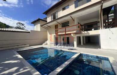 Imagem: A casa em condomínio possui 4 Dormitórios, 4 Banheiros, 4