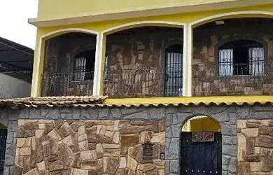 Imagem: A casa possui 3 Dormitórios, 3 Banheiros, 3 Vagas na garagem