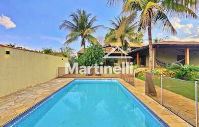 Imagem: A casa em condomínio possui 4 Dormitórios, 5 Banheiros, 5