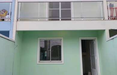 Imagem: A casa possui 2 Dormitórios, 2 Banheiros e está localizado