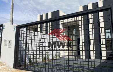 Imagem: A casa possui 3 Dormitórios, 2 Banheiros, 2 Vagas na garagem