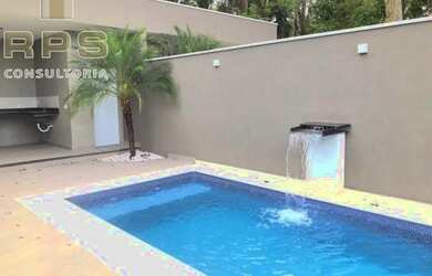 Imagem: A casa possui 3 Dormitórios, 4 Banheiros, 2 Vagas na garagem