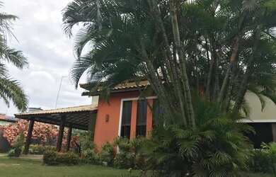 Imagem: A casa possui 3 Dormitórios, 5 Banheiros, 5 Vagas na garagem