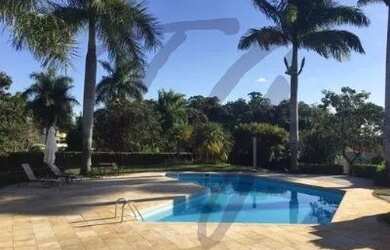 Imagem: A casa em condomínio possui 5 Dormitórios, 5 Banheiros, 5