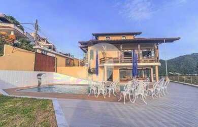 Imagem: A casa em condomínio possui 5 Dormitórios, 2 Banheiros, 4