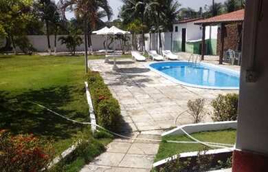 Imagem: A casa possui 5 Dormitórios, 5 Banheiros, 5 Vagas na garagem