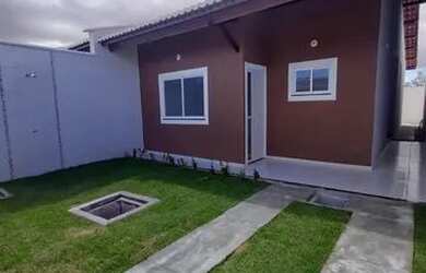 Imagem: A casa possui 3 Dormitórios, 2 Banheiros, 2 Vagas na garagem